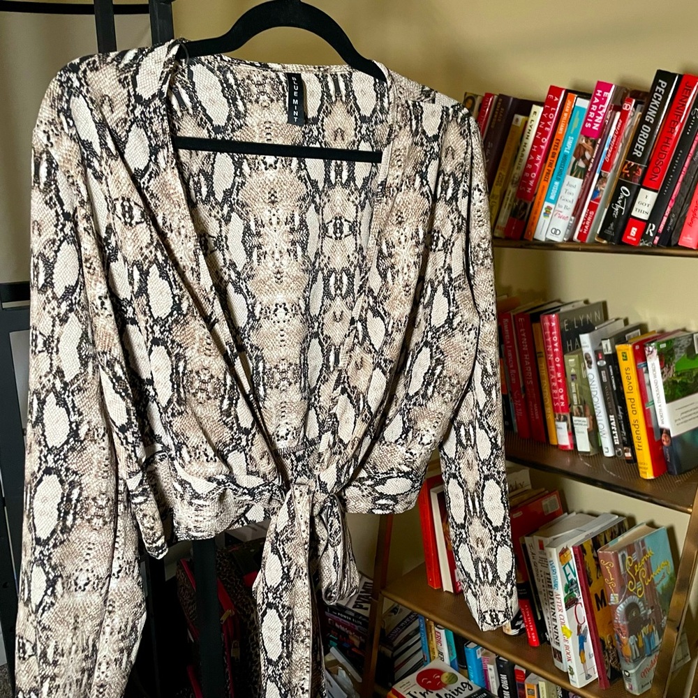 Sheer thin black and white blouse barely warn